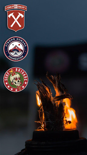 Strong Humans retreat participants gathered on the beach at sunset