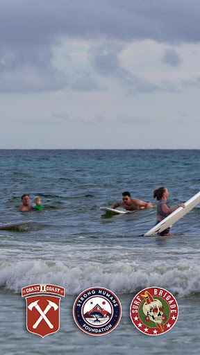 Retreat guests sharing a meal outdoors
